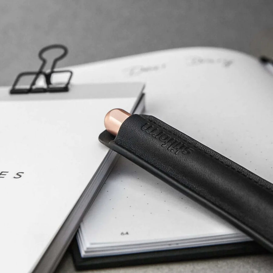 Stilform Leather Pouch in Black, showcasing a sleek and minimalist design holding a Stilform Rose Moon pen