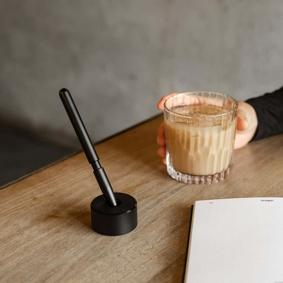 Stilform Aluminium Base holding a pen