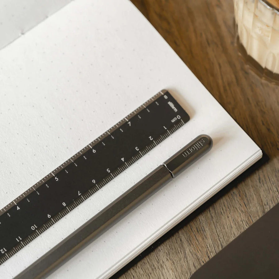 Stilform Aluminium Ruler in Warp Black finish, highlighting its sleek lines and durable construction